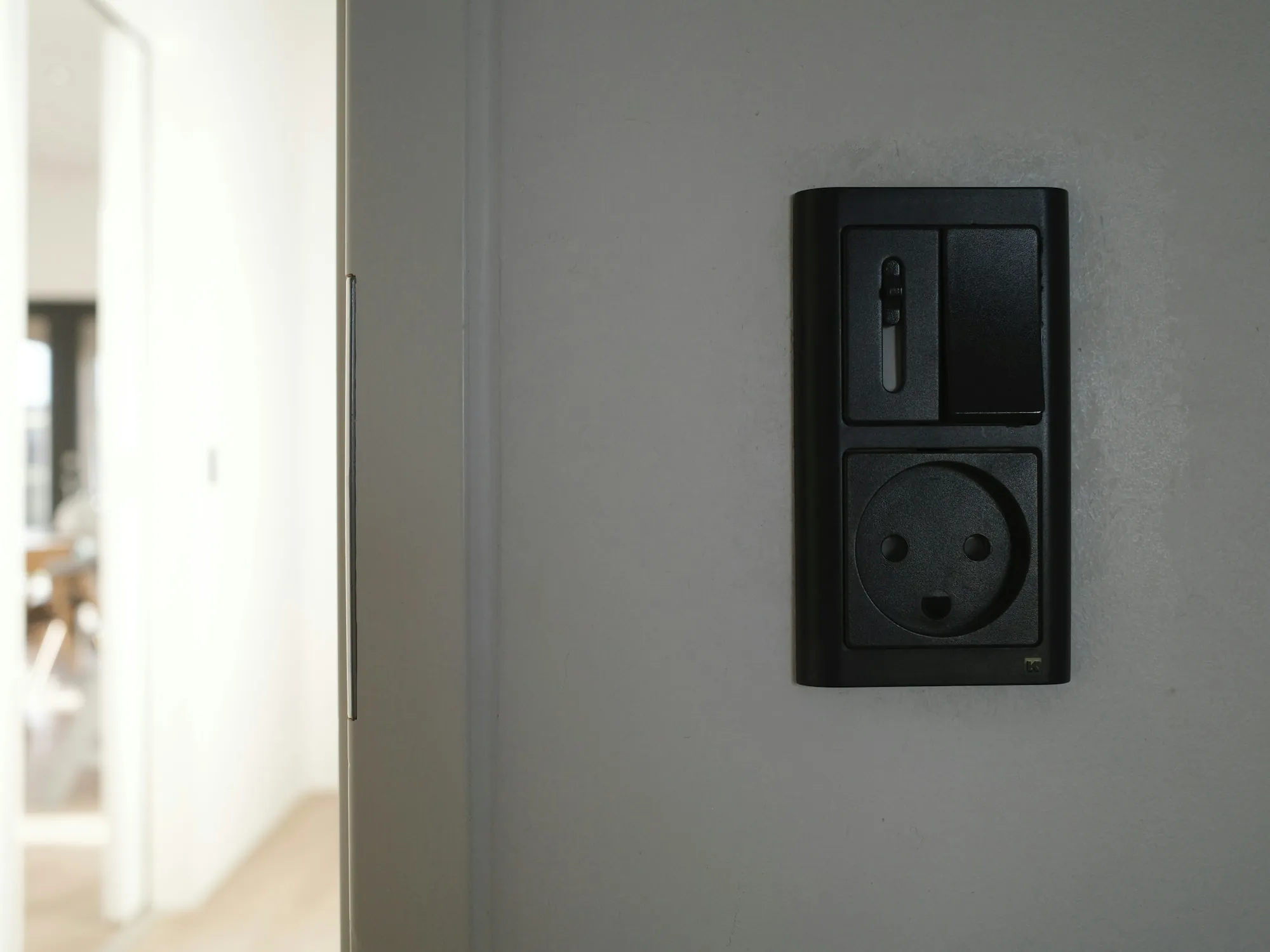 Wall switch and outlet in a finished room