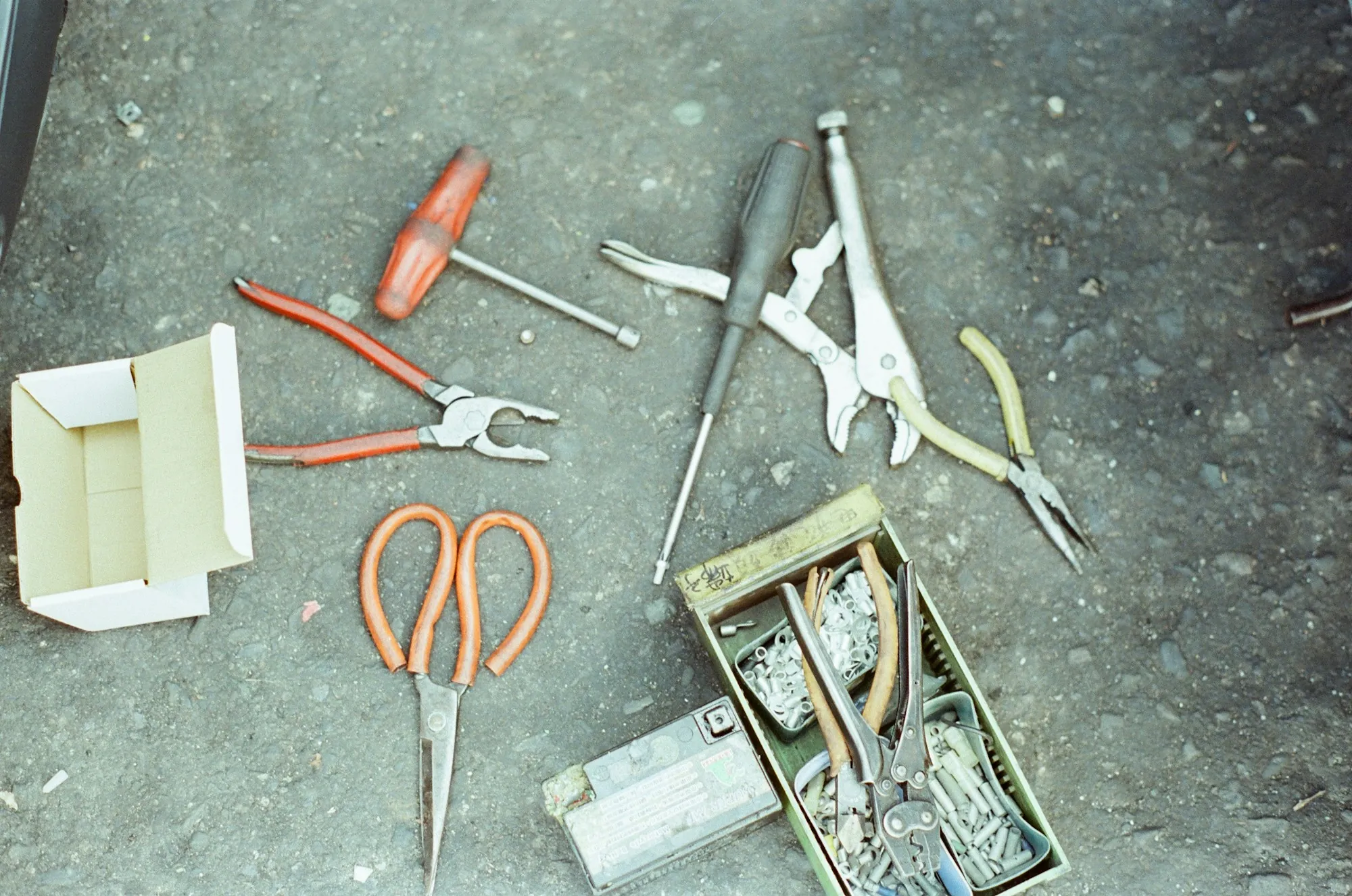 Electrician hand tools on a concrete floor