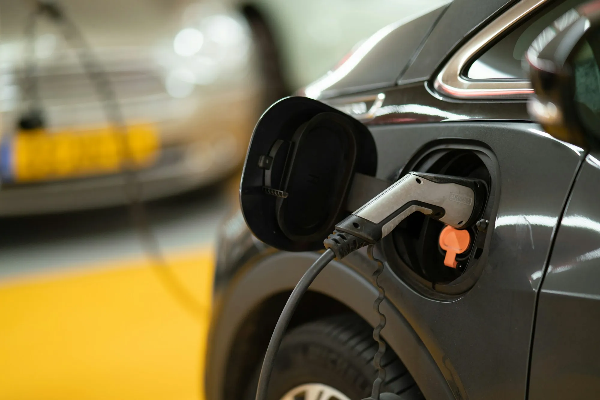 Electric car plugged in to charge
